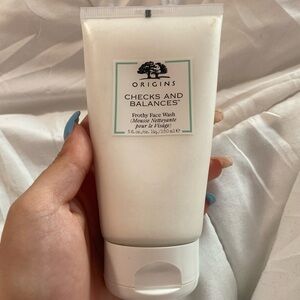 origins checks and balances face wash